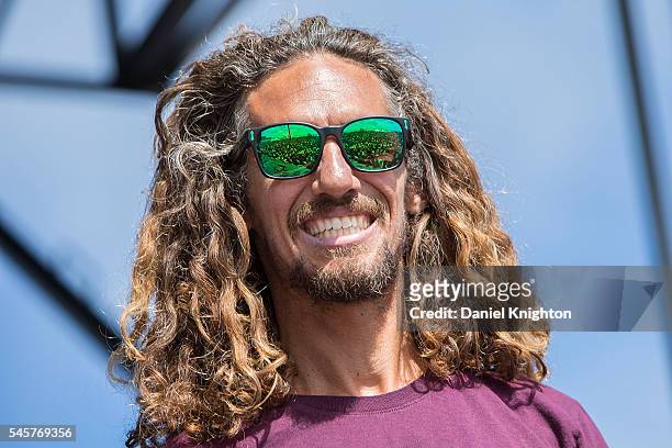 Surfing legend Rob Machado speaks on stage at Moonlight Beach on July 9, 2016 in Encinitas, California.