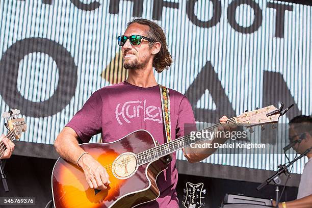 Surfing legend Rob Machado sits in with Switchfoot at Moonlight Beach on July 9, 2016 in Encinitas, California.