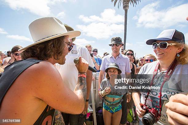 Musician Zachary Barnett of American Authors performs in the crowd at Moonlight Beach on July 9, 2016 in Encinitas, California.