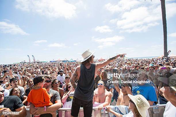 Musician Zachary Barnett of American Authors performs in the crowd at Moonlight Beach on July 9, 2016 in Encinitas, California.