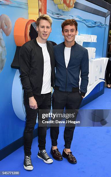 Dustin Lance Black and Tom Daley arrive for the UK Premiere of "Finding Dory" at Odeon Leicester Square on July 10, 2016 in London, England.