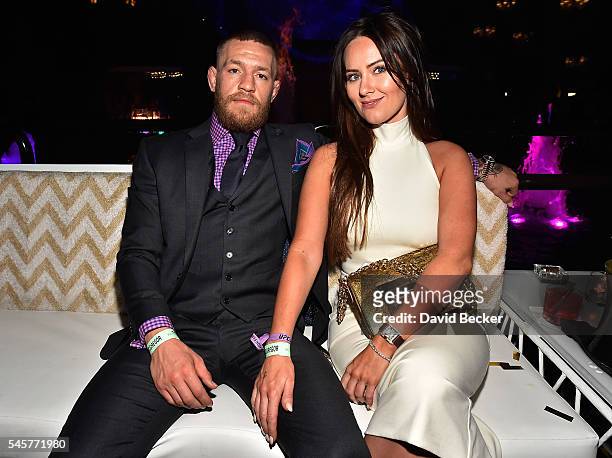 Mixed martial artist Conor McGregor and Dee Devlin attend his birthday celebration at Intrigue Nightclub at Wynn Las Vegas early July 10, 2016 in Las...