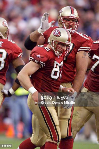 Eric Johnson of the San Fransisco 49ers and teammates Matt Willig celebrate during the game against the New Orleans Saints at 3 Com Stadium in San...