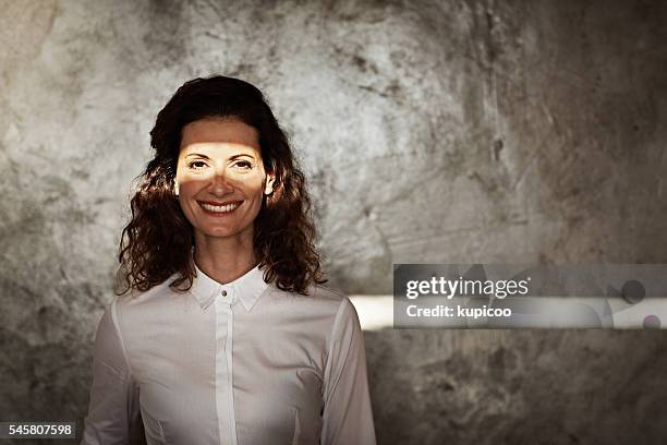 success is shining on her - face look right stock pictures, royalty-free photos & images