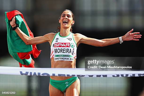 Sara Moreira of Portugal celebrates as she crosses the finish line and wins the gold medal in the Half Marathon Women on day 5 of the 23rd European...