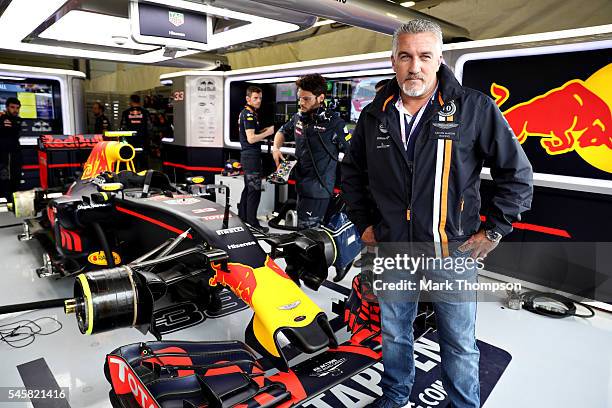 Celebrity baker and TV personality Paul Hollywood stands in the Red Bull Racing garage before the Formula One Grand Prix of Great Britain at...