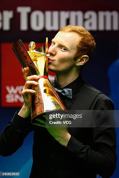 Anthony McGill of Scotland poses with trophy after winning the final match against Kyren Wilson of England on day five of Indian Open 2016 at...