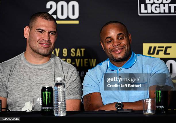Teammates Cain Velasquez and Daniel Cormier speak to the media during the UFC 200 post-fight press conference at T-Mobile Arena on July 9, 2016 in...