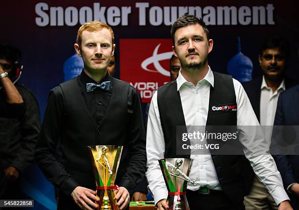 Anthony McGill of Scotland and Kyren Wilson of England pose with trophies after the final match on day five of Indian Open 2016 at Hyderabad...