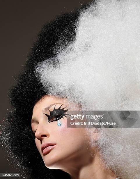 woman with bizarre eye makeup and hair - white afro wig stock pictures, royalty-free photos & images