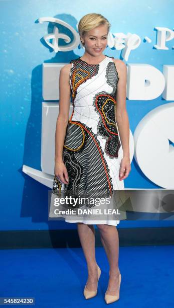 Australian born actress Portia de Rossi poses for photographers as she arrives to attend the UK premiere of the film 'Finding Dory' in London's...