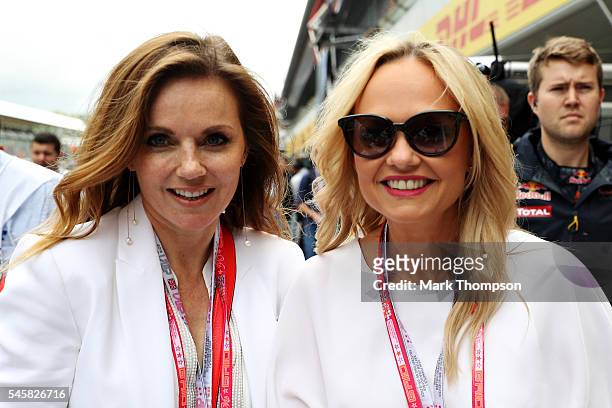 Geri Halliwell and Emma Bunton in the Pitlane before the Formula One Grand Prix of Great Britain at Silverstone on July 10, 2016 in Northampton,...