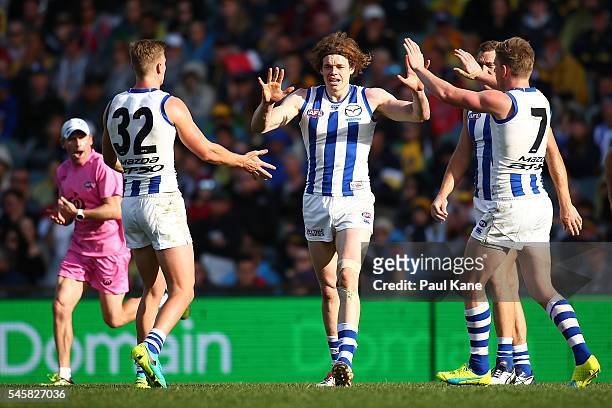 Ben Brown of the Kangaroos celebrates a goal during the round 16 AFL match between the West Coast Eagles and the North Melbourne Kangaroos at Domain...