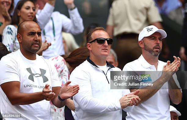 Shane Annun, Matt Little, Jamie Dalgado look on during the Men's Singles Final match between Andy Murray of Great Britain and Milos Raonic of Canada...