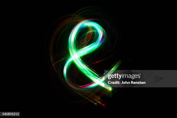 lights making ampersand - ampersand stock pictures, royalty-free photos & images