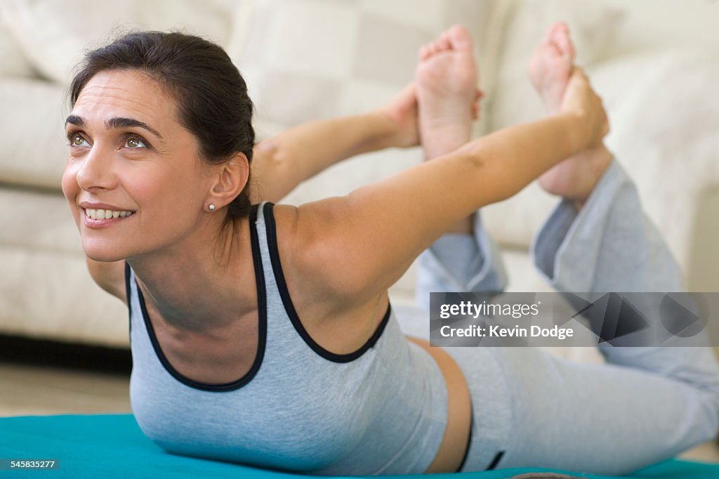 Woman Doing Yoga at Home