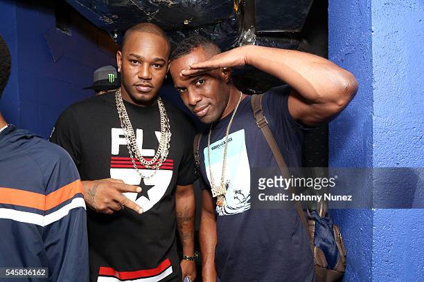 Recording artist Cam'ron and DJ Whoo Kid backstage at The Smokers Club concert event at Crosby Hotel on July 9, 2016 in New York City.