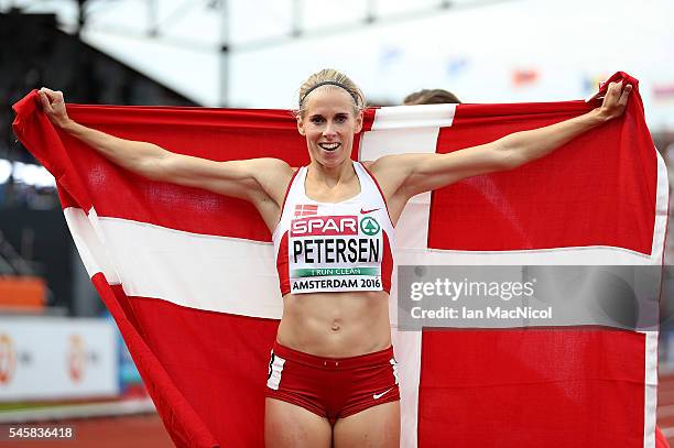 Sara Slott Petersen of Denmark celebrates after winning gold in the final of the womens 400m hurdles on day five of The 23rd European Athletics...