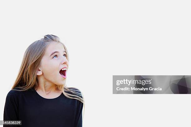 surprised young girl - girls open mouth imagens e fotografias de stock