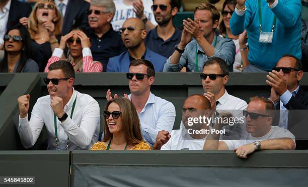 Kim Sears, Shane Annun, Matt Little watch on during the Men's Singles Final match between Andy Murray of Great Britain and Milos Raonic of Canada on...