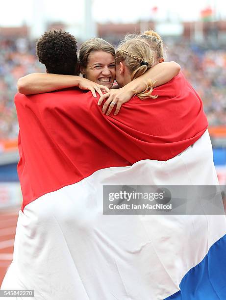 Dafne Schippers of The Netherlands celebrates with team mates after winning gold in the final of the womens 4x100m relay on day five of The 23rd...