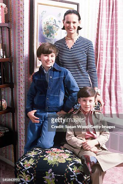 Swiss-born socialite Gloria Vanderbilt poses with her two sons Anderson Cooper and Carter Vanderbilt Cooper in their apartment in the UN Towers, New...