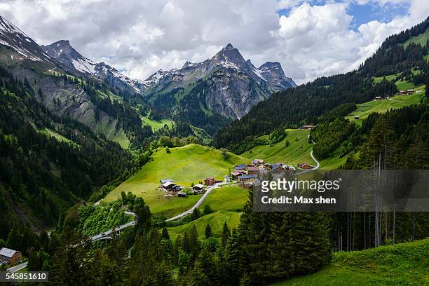 scenic mountain view of the alps in schrocken - austria stock pictures, royalty-free photos & images