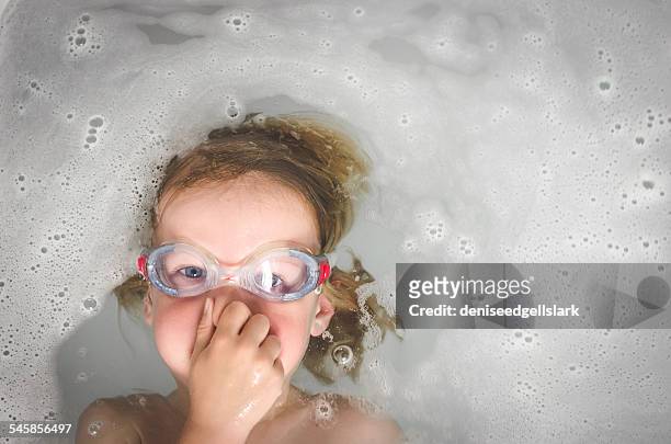 boy wearing goggles in the bath - simglasögon bildbanksfoton och bilder