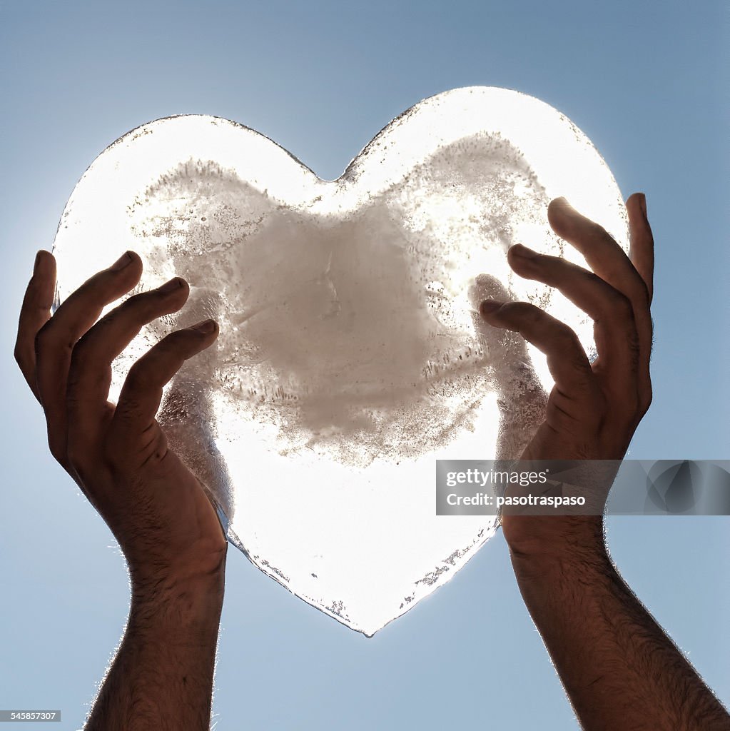 Person holding frozen heart