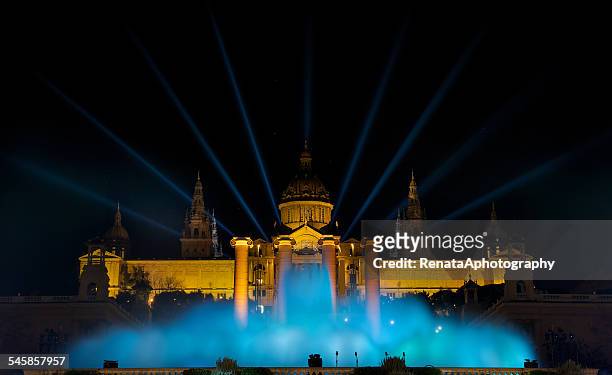 spain, catalonia, barcelona, night view of magic fountain against illuminated plaza espana - montjuic stock pictures, royalty-free photos & images
