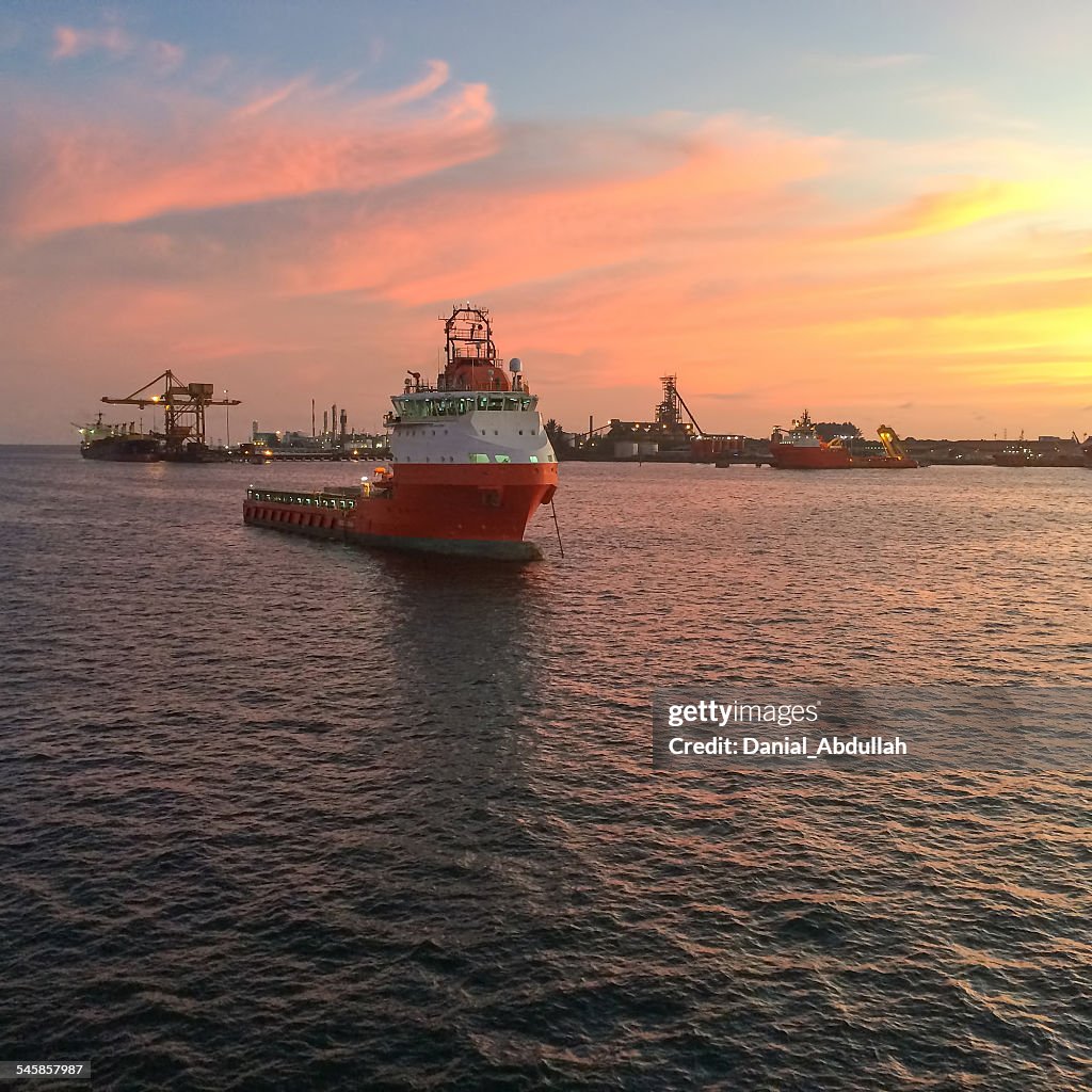 Oil Rig Protection Vessels Oil Rig Support Vessel Anchored In Port Harbor At Sunset High-Res Stock ...