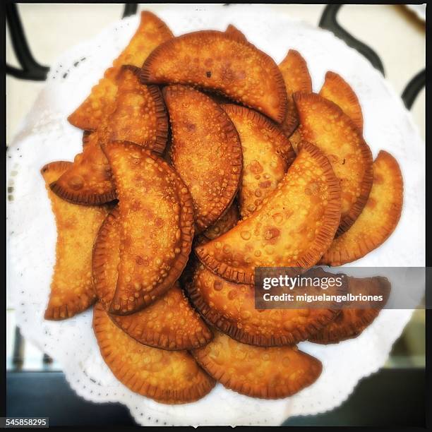 close-up view of stack of empanadas - empanadas fotografías e imágenes de stock