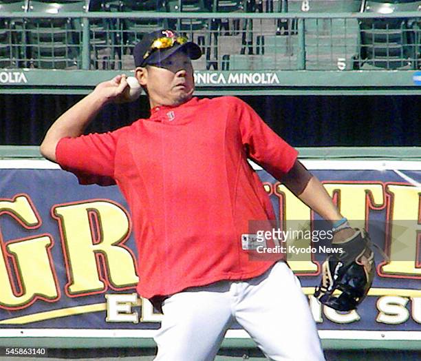 United States - Boston Red Sox right-hander Daisuke Matsuzaka takes part in a session of catch ahead of the team's game against the Oakland Athletics...