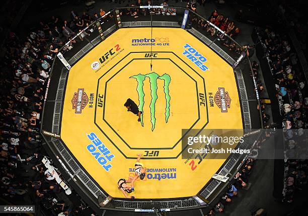 An overhead view of the Octagon as Amanda Nunes of Brazil punches Miesha Tate during the UFC 200 event at T-Mobile Arena on July 9, 2016 in Las...