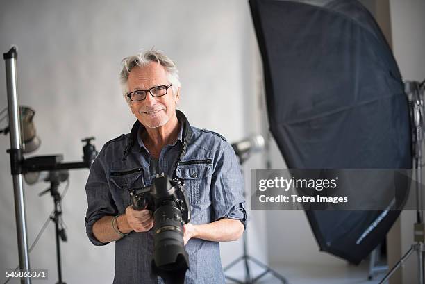 usa, new jersey, portrait of photographer in his studio - photographer fotografías e imágenes de stock