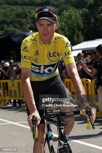 Christopher Froome of Great Britain riding for Team Sky in the yellow leader's jersey prepares to start stage nine of the 2016 Le Tour de France, a...