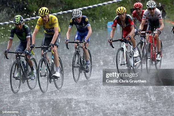 Christopher Froome of Great Britain riding for Team Sky in the yellow leader's jersey rides in the peloton during stage nine of the 2016 Le Tour de...