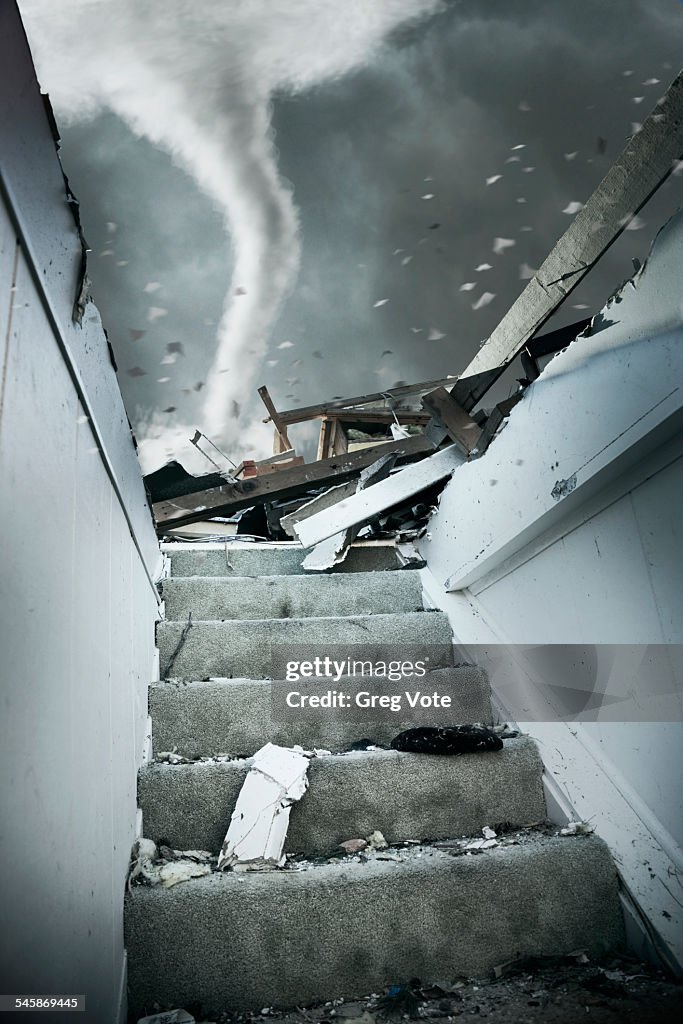 USA, Illinois, Demolished staircase of house during tornado