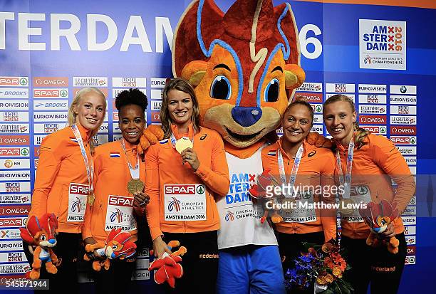 Marije van Hunenstijn, Jamile Samuel, Dafne Schippers, Naomi Sedney and Tessa van Schagen pictured with their gold medals after winning the Womens...