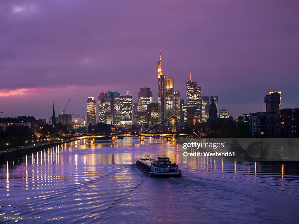 Germany, Hesse, View of Frankfurt am Main, Floesserbruecke and financial district at night