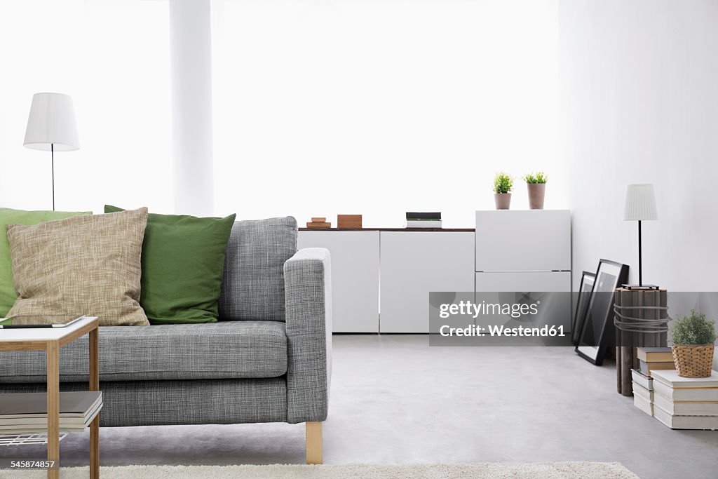 Modern living room with couch and sideboard