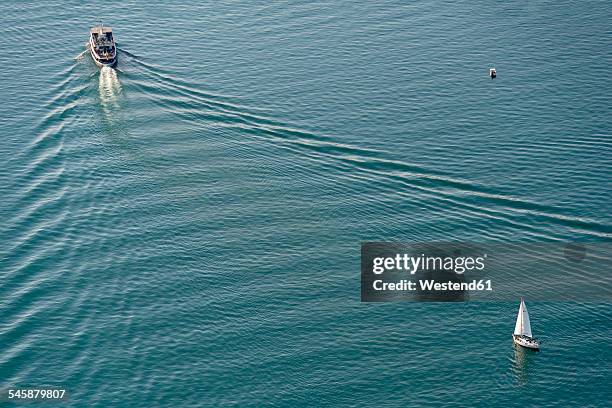 germany, baden-wuerttemberg, lake constance, aerial view of ship and sailboat - lake constance bildbanksfoton och bilder