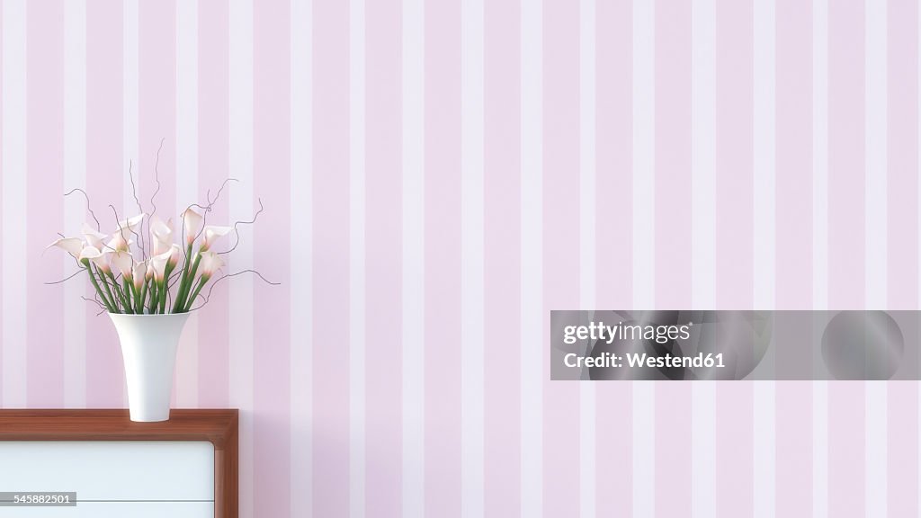 Sideboard with flower vase in front of striped pink wallpaper