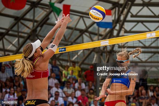 Anastasia Barsuk of Russia spikes against Barbara Hansel of Austria in a semi-final match during FIVB World Continental Cup Olympic Qualification on...