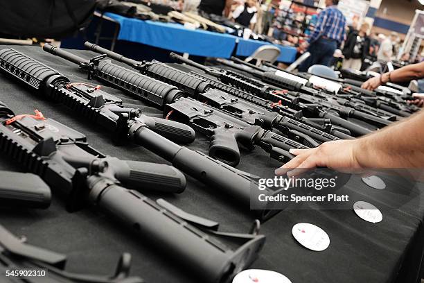 Guns sit for sale at a gun show where thousands of different weapons are displayed for sale on July 10, 2016 in Fort Worth, Texas. The Dallas and...