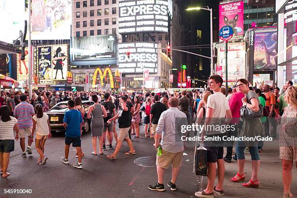 During a Black Lives Matter protest in New York City's Times Square following the shooting deaths of Alton Sterling and Philando Castile, activists...