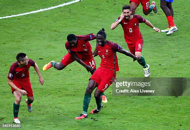 Eder of Portugal celebrates scoring the opening goal with his team mates during the UEFA EURO 2016 Final match between Portugal and France at Stade...