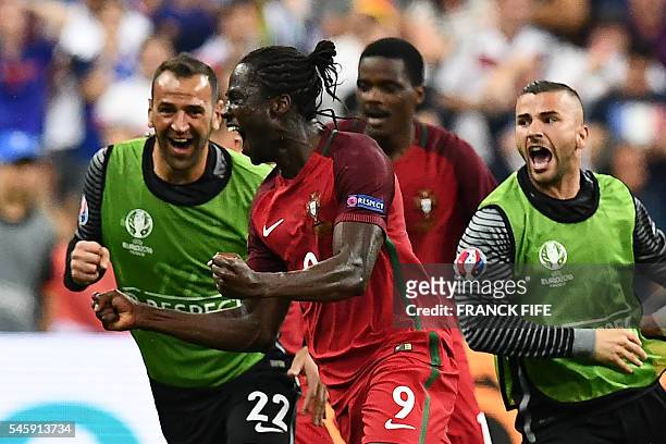 Portugal's forward Eder celebrates the team's first goal during the Euro 2016 final football match between France and Portugal at the Stade de France...