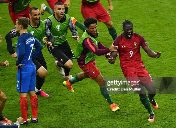 Eder of Portugal celebrates scoring the opening goal with his team mates during the UEFA EURO 2016 Final match between Portugal and France at Stade...