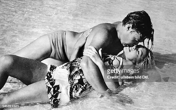 Boehm, Karlheinz - Actor, Austria - *- Scene from the movie 'The Stowaway'' with Martine Carol Directed by: Ralph Habib Australia / France 1957...